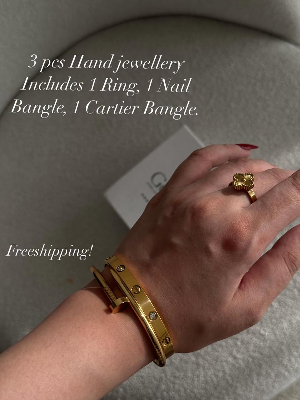 Nail and Cartier Bangle Stack with Clover Ring