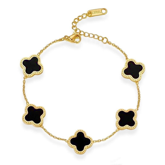 A gold-colored bracelet featuring black clover-shaped charms linked together on a chain.