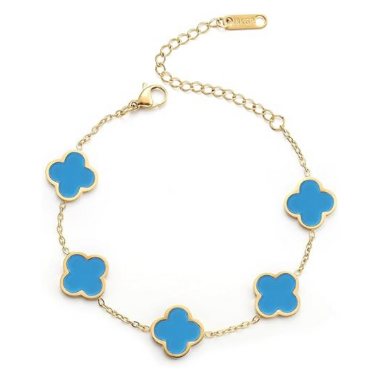 Gold bracelet with blue clover-shaped charms on a white background