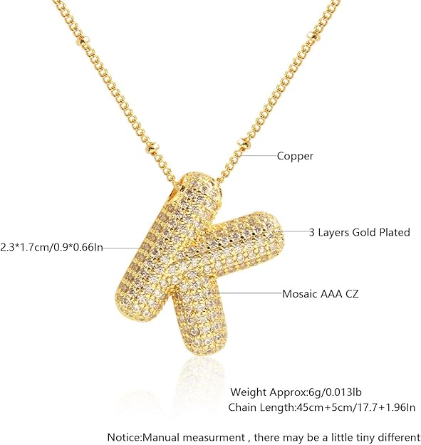 Gold necklace with a detailed pendant on a white background