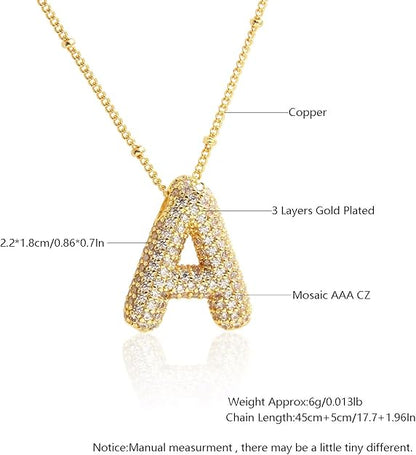 Gold necklace with letter 'A' pendant on a white background