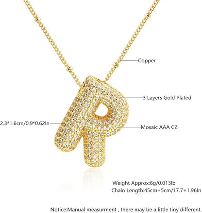 Gold necklace with letter 'R' pendant on a white background